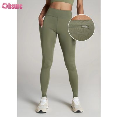 Getextureerde sportleggings fitness yoga sportbroek met ritssluiting ontwerp sport yoga leggings voor vrouwen
