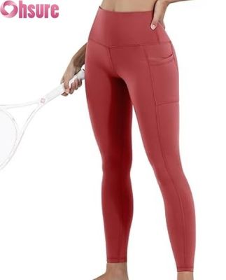 Vrouwelijke hoge middenbekkens, maagcontrole, yoga leggings met elastische bekleding van de taille en zakken