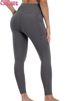 Vrouwelijke hoge middenbekkens, maagcontrole, yoga leggings met elastische bekleding van de taille en zakken