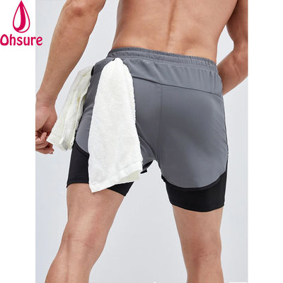 Training mannen Reflectieve band trektouw Taille 2 in 1 Sport fitness shorts Workout shorts voor mannen