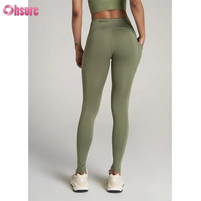 Getextureerde sportleggings fitness yoga sportbroek met ritssluiting ontwerp sport yoga leggings voor vrouwen