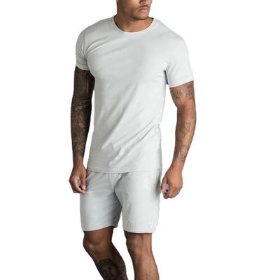 Leveranciers van groothandels in herenkleding Hoge kwaliteit heren katoenen T-shirt Aangepaste maat en logo Effen losvallende Gym heren T-shirt